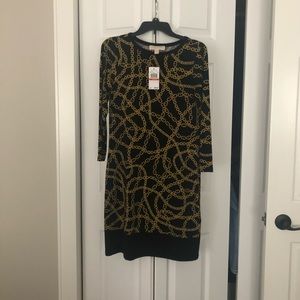 Great looking dress with heels or boots.